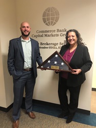 Danielle Rolfes, regional sales director for OneAmerica, presented the award to Ward.